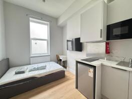 207, Uxbridge Road, London W12 9DH