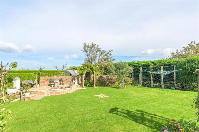 Gardens with field beyond