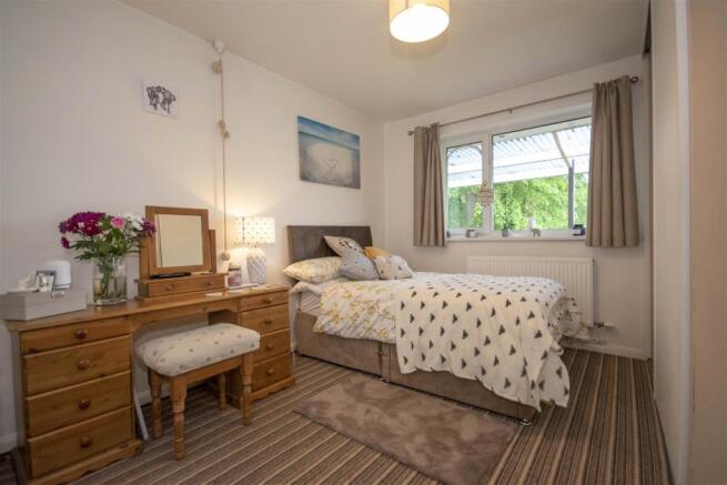 FIRST BEDROOM