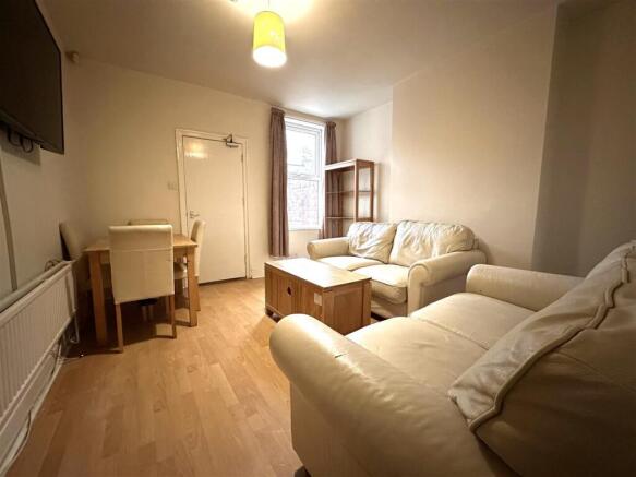 Inviting lounge with dining space and sofas....