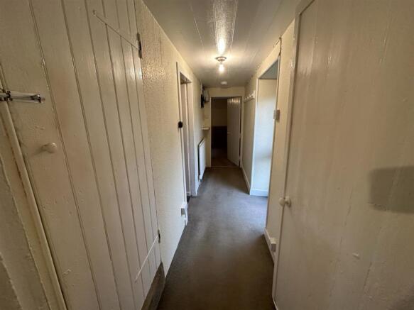 hall with stair door.JPEG