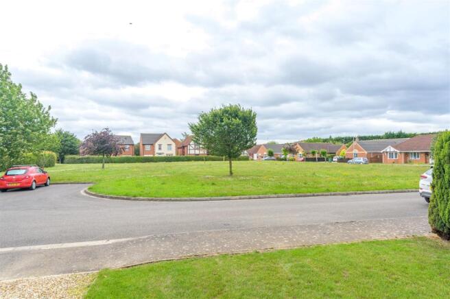 Green to Front of Property
