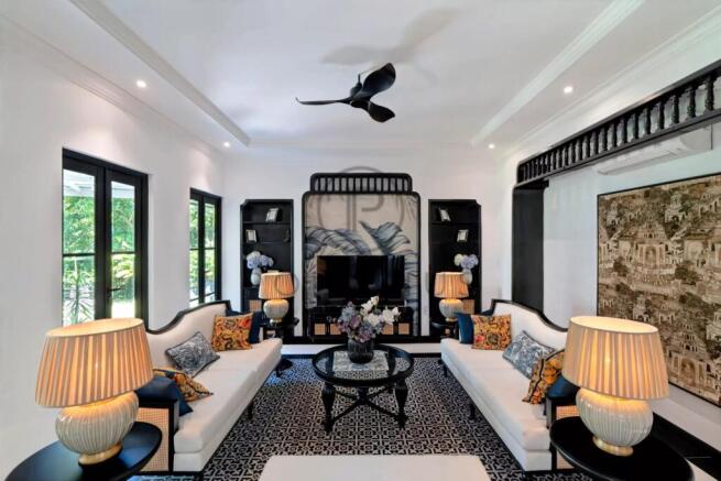 Elegant living room with modern decor, bright natu