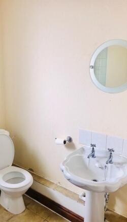 2nd bathroom includes a shower unit. 
