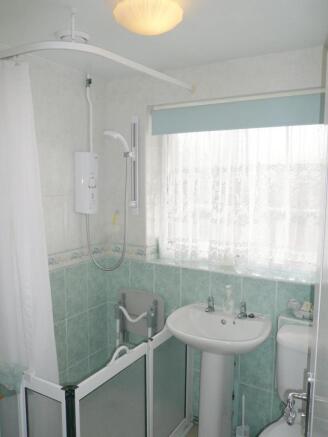 The fully-tiled Shower Room