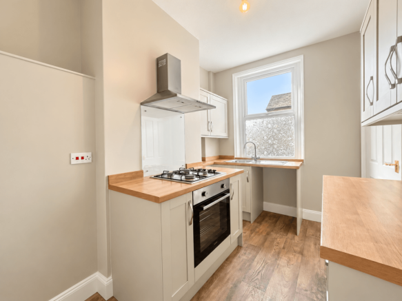 Bright Neutral Galley Kitchen