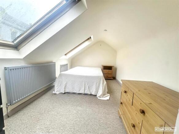 Bright attic double room with skylight and stor...