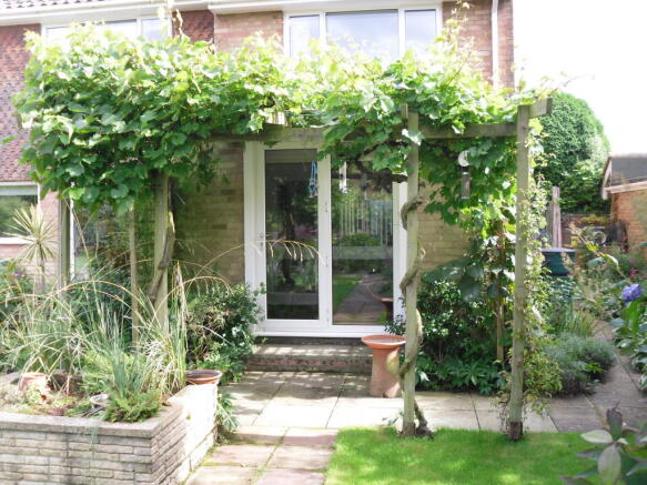 REAR OF GARDEN ROOM