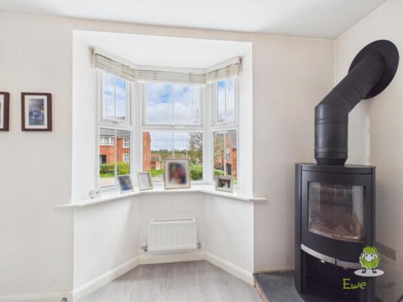 Front bay window and log burner - Ewemove Whitchur