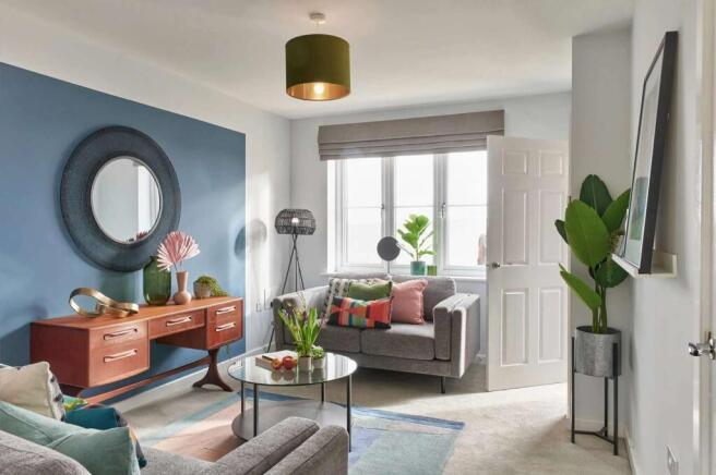 A cozy and vibrant living room with a mix of modern and vintage elements