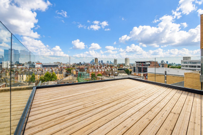 Modern Rooftop Terrace Skyline View.png