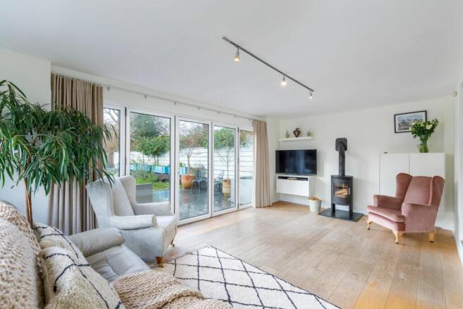 Reception room with bi-fold doors to patio