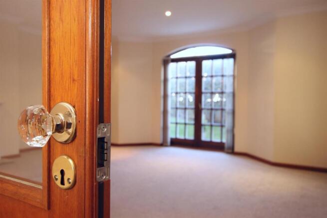 oak doors into lounge.jpg