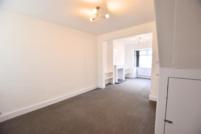 THROUGH LOUNGE/DINING ROOM