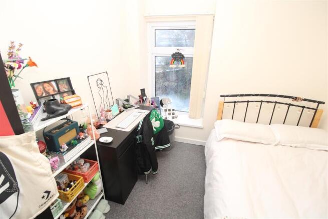 Bright bedroom with double bed and study desk...