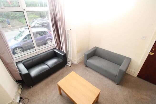 Bright lounge area with comfortable sofas...
