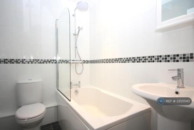 Bathroom With Over Bath Shower