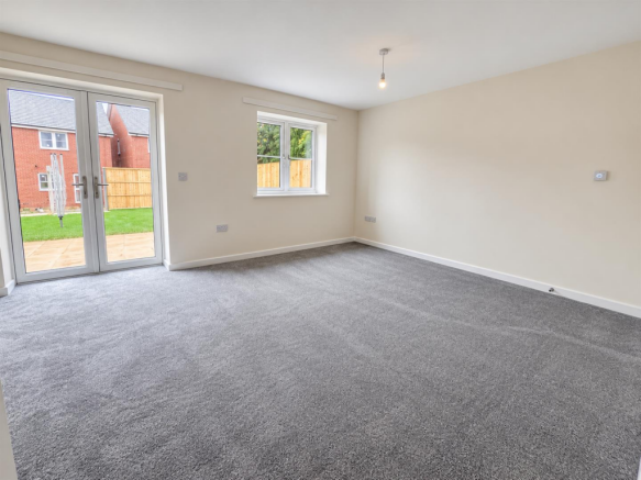 Bright Modern Room with Garden Views.png
