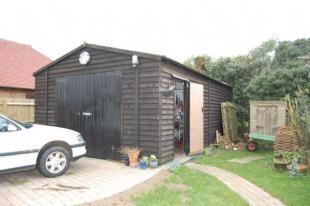 WOODEN OUTBUILDING