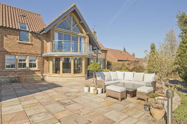 Patio to rear of House