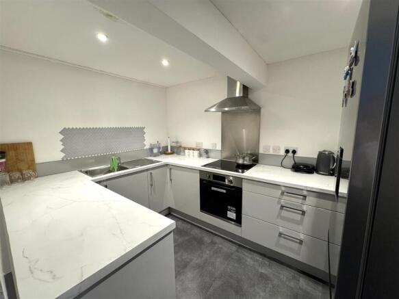 Kitchen with light worktops
