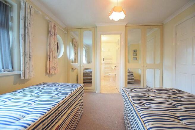 Master bedroom with ensuite bathroom