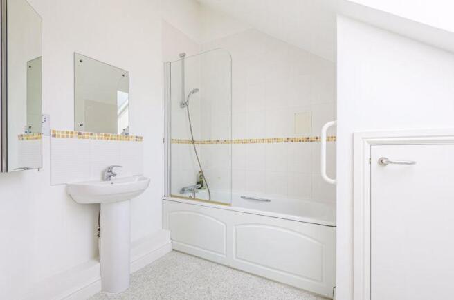 Bathroom with over-bath shower
