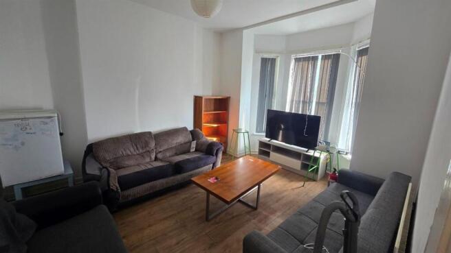 Bright living room with comfortable sofas...