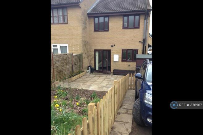Showing The Back Garden And Parking