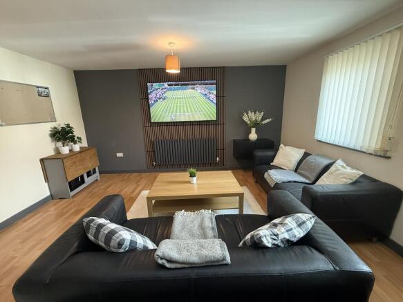 Living Area with 65 Inch Media Wall