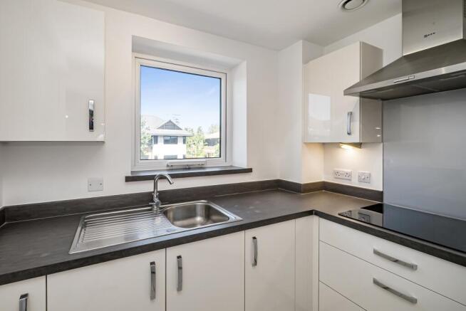 a kitchen with a window