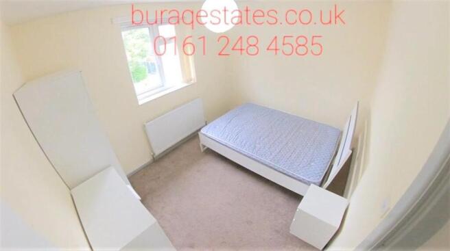 Bright single bedroom with a window providing n...