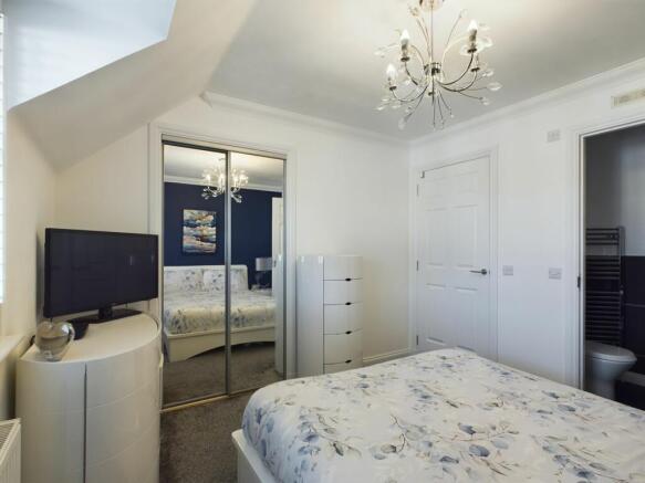 Master Bedroom with mirrored double wardrobes