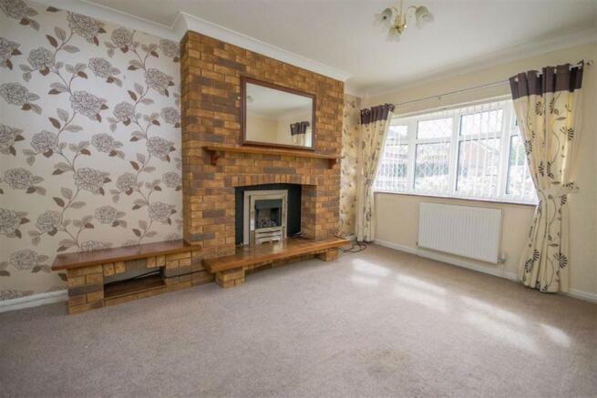THROUGH LOUNGE/DINING ROOM