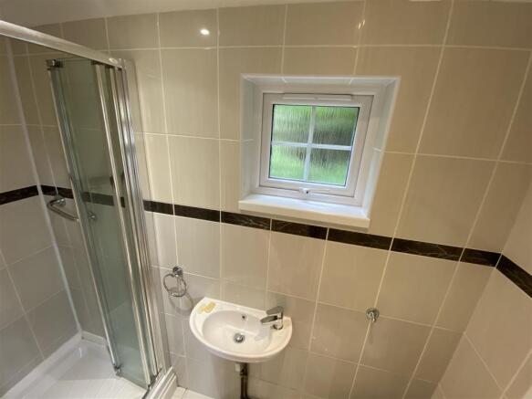 GROUND FLOOR SHOWER ROOM & WC