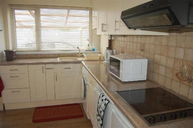Kitchen With Dining Area