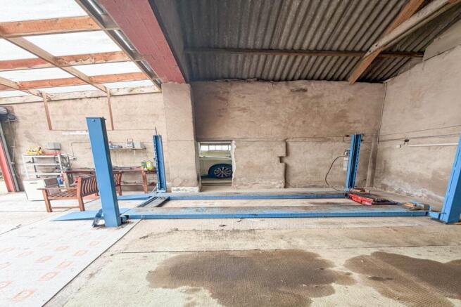 Garage with vehicle lift