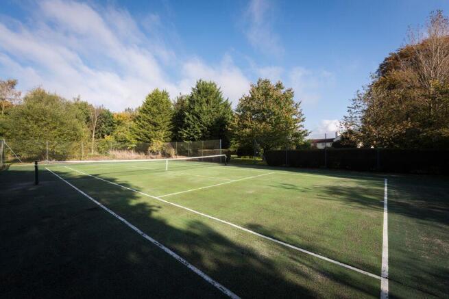 Enclosed Tennis Court