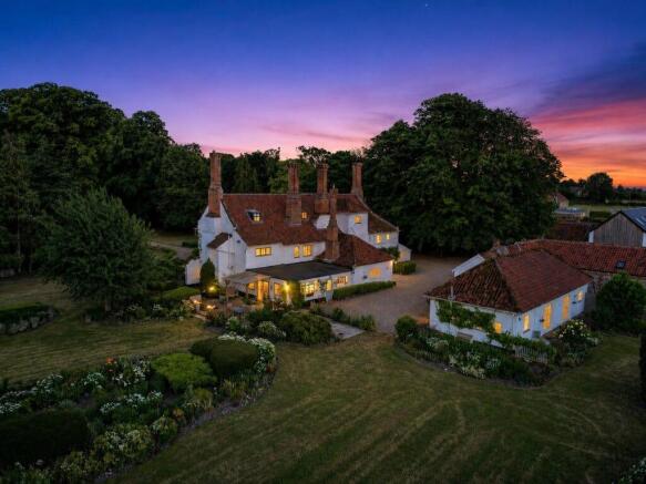 Aerial twilight view of Bury's Hall, Ashill, with