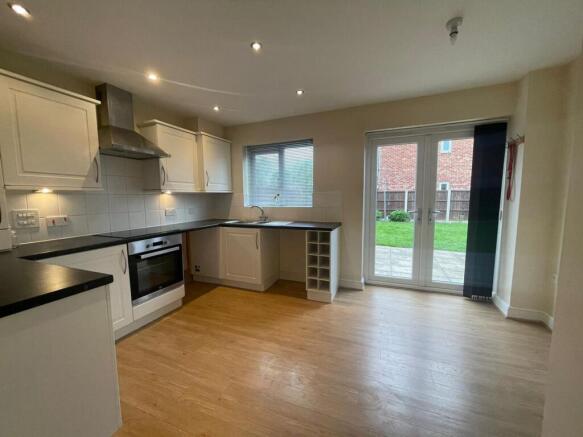 Double doors onto the rear garden