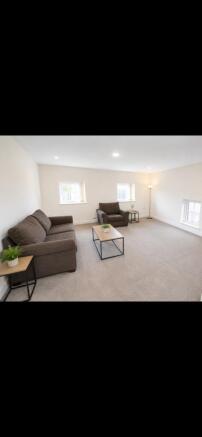 Spacious modern lounge with stylish furniture...