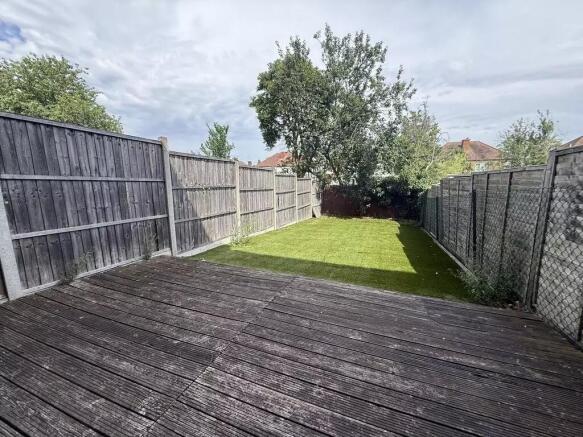 Spacious private garden with wooden decking...