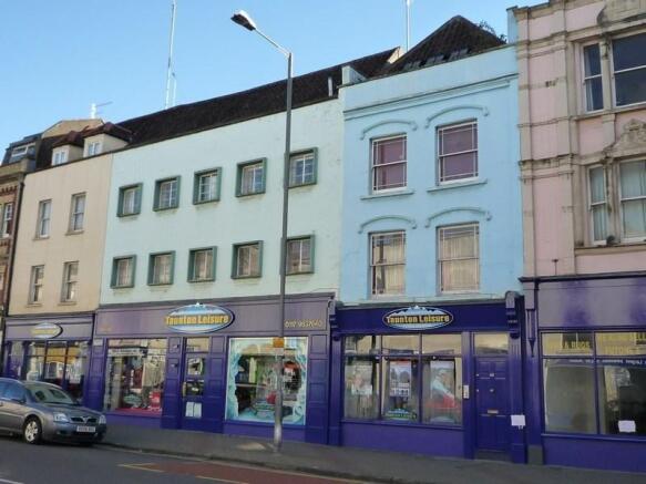 Charming high street exterior in a vibrant area...