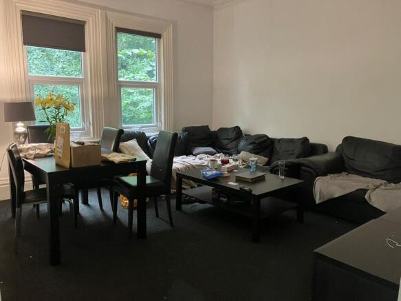 Spacious, comfortable living room with large co...