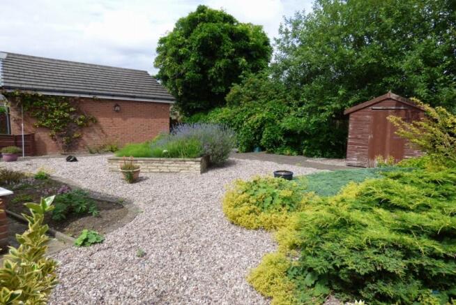 Garden and Side Shot of Garage