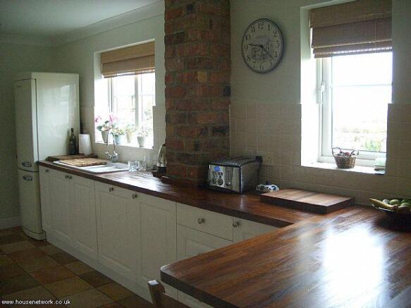 Kitchen adjoining dining room
