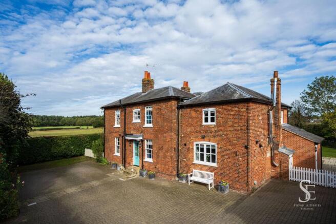 Front of House with Driveway