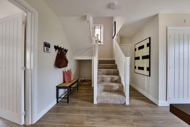Welcoming entrance hall offering a bright first impression of the home.