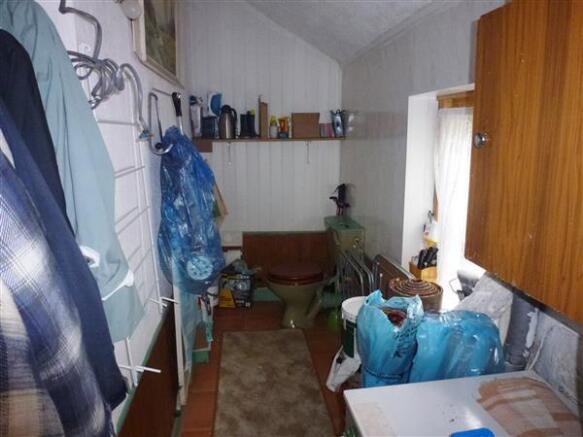 UTILTY AREA  AND CLOAKROOM