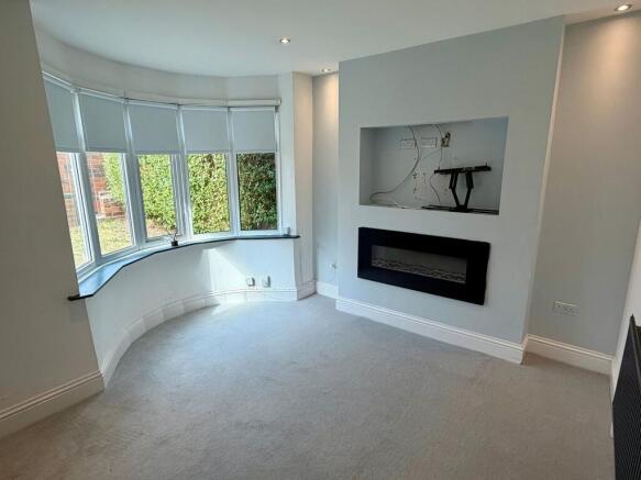 SITTING ROOM AND DINING KITCHEN